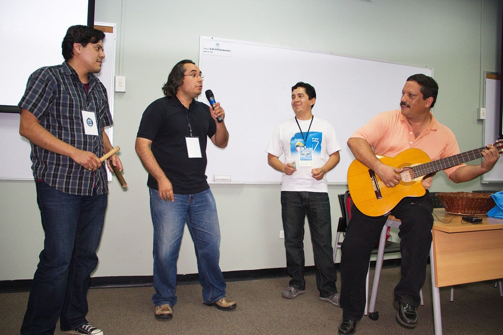 The closing session of DrupalCamp 2012, with a guitar